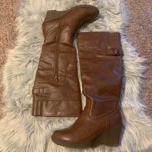 Bucco Wedge heel boots